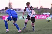 9 May 2025; Sean Keogh of Dundalk evades the tackle of Jamie Duggan of Bray Wanderers during the SSE Airtricity Men's First Division match between Dundalk and Bray Wanderers at Oriel Park in Dundalk, Louth. Photo by Tyler Miller/Sportsfile