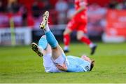 9 May 2025; Chris Forrester of St Patrick's Athletic awaits medical attention during the SSE Airtricity Men's Premier Division match between Shelbourne and St Patrick's Athletic at Tolka Park in Dublin. Photo by Stephen McCarthy/Sportsfile