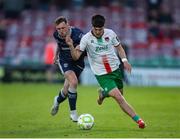 9 May 2025; Matthew Kiernan of Cork City in action against Gavin Whyte of Derry City during the SSE Airtricity Men's Premier Division match between Cork City and Derry City at Turner's Cross in Cork. Photo by Michael P Ryan/Sportsfile