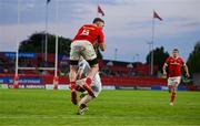 9 May 2025; Peter O'Mahony of Munster catches the ball ahead of Nathan Doak of Ulster on the way to scoring his side's sixth try during the United Rugby Championship match between Munster and Ulster at Thomond Park in Limerick. Photo by Brendan Moran/Sportsfile
