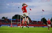 9 May 2025; Peter O'Mahony of Munster catches the ball ahead of Nathan Doak of Ulster on the way to scoring his side's sixth try during the United Rugby Championship match between Munster and Ulster at Thomond Park in Limerick. Photo by Brendan Moran/Sportsfile