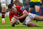 9 May 2025; Tom Farrell of Munster scores his side's fifth try during the United Rugby Championship match between Munster and Ulster at Thomond Park in Limerick. Photo by Brendan Moran/Sportsfile