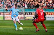 9 May 2025; Chris Forrester of St Patrick's Athletic in action against Mipo Odubeko of Shelbourne curing the SSE Airtricity Men's Premier Division match between Shelbourne and St Patrick's Athletic at Tolka Park in Dublin. Photo by Piaras Ó Mídheach/Sportsfile