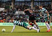 9 May 2025; Luke Heeney of Drogheda United in action against Darragh Nugent of Shamrock Rovers during the SSE Airtricity Men's Premier Division match between Shamrock Rovers and Drogheda United at Tallaght Stadium in Dublin. Photo by Thomas Flinkow/Sportsfile