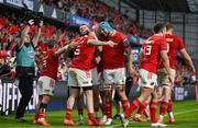 9 May 2025; Peter O'Mahony of Munster is congratulated by teammates after scoring their side's sixth try during the United Rugby Championship match between Munster and Ulster at Thomond Park in Limerick. Photo by Brendan Moran/Sportsfile