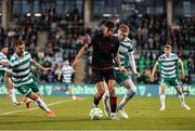 9 May 2025; Luke Heeney of Drogheda United in action against Darragh Nugent of Shamrock Rovers during the SSE Airtricity Men's Premier Division match between Shamrock Rovers and Drogheda United at Tallaght Stadium in Dublin. Photo by Thomas Flinkow/Sportsfile