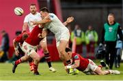 9 May 2025; Jacob Stockdale of Ulster is tackled by Calvin Nash and John Hodnett of Munster during the United Rugby Championship match between Munster and Ulster at Thomond Park in Limerick. Photo by John Dickson/Sportsfile