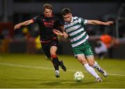 9 May 2025; Josh Honohan of Shamrock Rovers in action against Owen Lambe of Drogheda United during the SSE Airtricity Men's Premier Division match between Shamrock Rovers and Drogheda United at Tallaght Stadium in Dublin. Photo by David Fitzgerald/Sportsfile