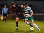 9 May 2025; Josh Honohan of Shamrock Rovers in action against Owen Lambe of Drogheda United during the SSE Airtricity Men's Premier Division match between Shamrock Rovers and Drogheda United at Tallaght Stadium in Dublin. Photo by David Fitzgerald/Sportsfile