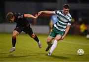 9 May 2025; Josh Honohan of Shamrock Rovers in action against Owen Lambe of Drogheda United during the SSE Airtricity Men's Premier Division match between Shamrock Rovers and Drogheda United at Tallaght Stadium in Dublin. Photo by David Fitzgerald/Sportsfile
