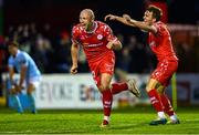 9 May 2025; Kerr McInroy of Shelbournes, left, celebrates with team-mate James Norris after scoring their side's second and winning goal during the SSE Airtricity Men's Premier Division match between Shelbourne and St Patrick's Athletic at Tolka Park in Dublin. Photo by Piaras Ó Mídheach/Sportsfile