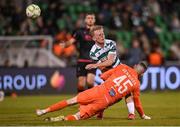 9 May 2025; Drogheda United goalkeeper Luke Dennison heads the ball off Michael Noonan of Shamrock Rovers in the build up to their third goal during the SSE Airtricity Men's Premier Division match between Shamrock Rovers and Drogheda United at Tallaght Stadium in Dublin. Photo by David Fitzgerald/Sportsfile