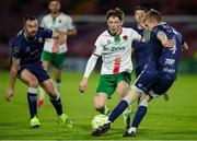 9 May 2025; Kitt Nelson of Cork City in action against Robbie Benson, left, and Ciaran Harkin of Derry City during the SSE Airtricity Men's Premier Division match between Cork City and Derry City at Turner's Cross in Cork. Photo by Michael P Ryan/Sportsfile