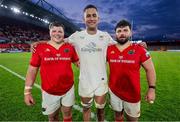9 May 2025; Cormac Izuchukwu of Ulster, centre, with Fineen Wycherley and Michael Milne of Munster after the United Rugby Championship match between Munster and Ulster at Thomond Park in Limerick. Photo by John Dickson/Sportsfile