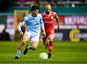 9 May 2025; Kian Leavy of St Patrick's Athletic in action against Mark Coyle of Shelbourne during the SSE Airtricity Men's Premier Division match between Shelbourne and St Patrick's Athletic at Tolka Park in Dublin. Photo by Piaras Ó Mídheach/Sportsfile
