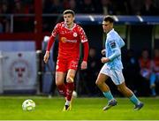 9 May 2025; Sean Gannon of Shelbourne gets away from Mason Melia of St Patrick's Athletic during the SSE Airtricity Men's Premier Division match between Shelbourne and St Patrick's Athletic at Tolka Park in Dublin. Photo by Piaras Ó Mídheach/Sportsfile