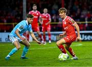 9 May 2025; James Norris of Shelbourne in action against Barry Baggley of St Patrick's Athletic during the SSE Airtricity Men's Premier Division match between Shelbourne and St Patrick's Athletic at Tolka Park in Dublin. Photo by Piaras Ó Mídheach/Sportsfile