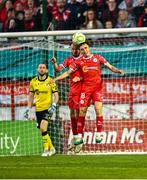 9 May 2025; Shelbourne players Mark Coyle, left, and James Norris under a dropping ball during the SSE Airtricity Men's Premier Division match between Shelbourne and St Patrick's Athletic at Tolka Park in Dublin. Photo by Piaras Ó Mídheach/Sportsfile