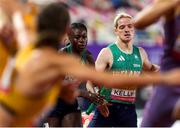 10 May 2025; Rhasidat Adeleke of Ireland, left, takes the baton from teammate Conor Kelly whilst competing in the mixed 4x400m during day one of the 2025 World Athletics Relays at Guangdong Olympic Stadium in Guangzhou, China. Photo by Nikola Krstic/Sportsfile