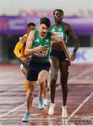 10 May 2025; Cillín Greene of Ireland, left, takes the baton from teammate Rhasidat Adeleke, right, whilst competing in the mixed 4x400m relay during day one of the 2025 World Athletics Relays at Guangdong Olympic Stadium in Guangzhou, China. Photo by Nikola Krstic/Sportsfile