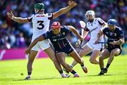 10 May 2025; Lee Chin of Wexford in action against Fintan Burke of Galway during the Leinster GAA Hurling Senior Championship Round 3 match between Galway and Wexford at Pearse Stadium in Galway. Photo by Piaras Ó Mídheach/Sportsfile