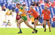 10 May 2025; Susanne White of Donegal in action against Aoife McCoy of Armagh during the TG4 Ulster LGFA Senior Football Championship final match between Armagh and Donegal at St Tiernach's Park in Clones, Monaghan. Photo by Ramsey Cardy/Sportsfile