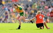 10 May 2025; Roisin Rodgers of Donegal in action against Cait Towe of Armagh during the TG4 Ulster LGFA Senior Football Championship final match between Armagh and Donegal at St Tiernach's Park in Clones, Monaghan. Photo by Ramsey Cardy/Sportsfile