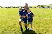 10 May 2025; Eoghan Duffy captain of Leinster with his kids 1 year old Isla and 5 year old Harry after the Junior Interprovincial Rugby Championship Round 2 match between Leinster and Connacht at Balbriggan RFC in Balbriggan, Dublin. Photo by Matt Browne/Sportsfile