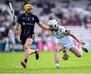 10 May 2025; Colm Molloy of Galway in action against Damien Reck of Wexford during the Leinster GAA Hurling Senior Championship Round 3 match between Galway and Wexford at Pearse Stadium in Galway. Photo by Piaras Ó Mídheach/Sportsfile
