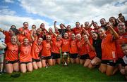 10 May 2025; Armagh players celebrate with the trophy after the TG4 Ulster LGFA Senior Football Championship final match between Armagh and Donegal at St Tiernach's Park in Clones, Monaghan. Photo by Ramsey Cardy/Sportsfile
