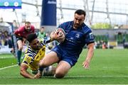 10 May 2025; Rónan Kelleher of Leinster beats the tackle  of Fetuli Paea of Zebre Parma on the way to scoring his side's frst try during the United Rugby Championship match between Leinster and Zebre Parma at the Aviva Stadium in Dublin. Photo by Brendan Moran/Sportsfile