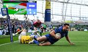 10 May 2025; Rónan Kelleher of Leinster beats the tackle  of Fetuli Paea of Zebre Parma on the way to scoring his side's frst try during the United Rugby Championship match between Leinster and Zebre Parma at the Aviva Stadium in Dublin. Photo by Brendan Moran/Sportsfile