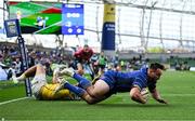 10 May 2025; Rónan Kelleher of Leinster beats the tackle of Fetuli Paea of Zebre Parma on the way to scoring his side's frst try during the United Rugby Championship match between Leinster and Zebre Parma at the Aviva Stadium in Dublin. Photo by Brendan Moran/Sportsfile