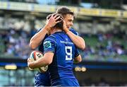 10 May 2025; Luke McGrath of Leinster, 9, celebrates with teammate Garry Ringrose after scoring their side's second try during the United Rugby Championship match between Leinster and Zebre Parma at the Aviva Stadium in Dublin. Photo by Seb Daly/Sportsfile