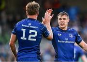 10 May 2025; Jordie Barrett of Leinster, 12,  celebrates with teammate Garry Ringrose after scoring their side's fifth try during the United Rugby Championship match between Leinster and Zebre Parma at the Aviva Stadium in Dublin. Photo by Seb Daly/Sportsfile