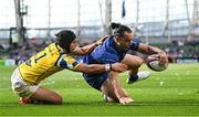 10 May 2025; James Lowe of Leinster scores his side's sixth try, despite the tackle of Zebre Parma's Simone Gesi, during the United Rugby Championship match between Leinster and Zebre Parma at the Aviva Stadium in Dublin. Photo by Seb Daly/Sportsfile