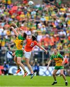 10 May 2025; Hugh McFadden of Donegal in action against Callum O'Neill of Armagh during the Ulster GAA Football Senior Championship final match between Armagh and Donegal at St Tiernach's Park in Clones, Monaghan. Photo by David Fitzgerald/Sportsfile