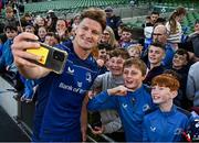 10 May 2025; Jordie Barrett of Leinster takes a selfie with supporters after the United Rugby Championship match between Leinster and Zebre Parma at the Aviva Stadium in Dublin. Photo by Seb Daly/Sportsfile