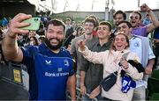 10 May 2025; Rabah Slimani of Leinster takes a selfie with supporters after the United Rugby Championship match between Leinster and Zebre Parma at the Aviva Stadium in Dublin. Photo by Seb Daly/Sportsfile