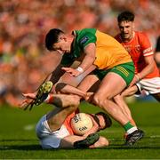 10 May 2025; Niall Grimley of Armagh in action against Michael Langan of Donegal during the Ulster GAA Football Senior Championship final match between Armagh and Donegal at St Tiernach's Park in Clones, Monaghan. Photo by Ramsey Cardy/Sportsfile