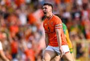 10 May 2025; Oisin Conaty of Armagh celebrates kicking a point during the Ulster GAA Football Senior Championship final match between Armagh and Donegal at St Tiernach's Park in Clones, Monaghan. Photo by Ramsey Cardy/Sportsfile