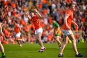 10 May 2025; Oisin Conaty of Armagh celebrates kicking a point during the Ulster GAA Football Senior Championship final match between Armagh and Donegal at St Tiernach's Park in Clones, Monaghan. Photo by Ramsey Cardy/Sportsfile