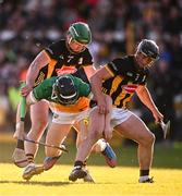 10 May 2025; Eoin Burke of Offaly is tackled by Tommy Walsh, left, and Mikey Butler of Kilkenny during the Leinster GAA Hurling Senior Championship Round 3 match between Kilkenny and Offaly at UPMC Nowlan Park in Kilkenny. Photo by Ben McShane/Sportsfile
