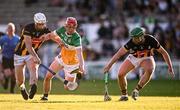 10 May 2025; Tommy Walsh of Kilkenny wins possession of a loose sliotar ahead of Charlie Mitchell of Offaly and Kilkenny teammate Mikey Carey, left, during the Leinster GAA Hurling Senior Championship Round 3 match between Kilkenny and Offaly at UPMC Nowlan Park in Kilkenny. Photo by Ben McShane/Sportsfile