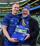 10 May 2025; Ciarán Frawley of Leinster with his grandfather Justin Maguire after his 100th Leinster cap following the United Rugby Championship match between Leinster and Zebre Parma at the Aviva Stadium in Dublin. Photo by Brendan Moran/Sportsfile