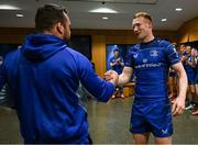 10 May 2025; Ciarán Frawley of Leinster, right, is presented with a jersey by teammate Cian Healy to mark his 100th Leinster cap following the United Rugby Championship match between Leinster and Zebre Parma at the Aviva Stadium in Dublin. Photo by Brendan Moran/Sportsfile