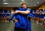 10 May 2025; Ciarán Frawley of Leinster, right, embraces teammate Cian Healy after bring presented with a jersey  to mark his 100th Leinster cap following the United Rugby Championship match between Leinster and Zebre Parma at the Aviva Stadium in Dublin. Photo by Brendan Moran/Sportsfile