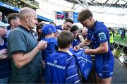 10 May 2025; Jordie Barrett of Leinster signs autographs after the United Rugby Championship match between Leinster and Zebre Parma at the Aviva Stadium in Dublin. Photo by Brendan Moran/Sportsfile