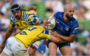 10 May 2025; Jamison Gibson-Park of Leinster is tackled by Filippo Drago of Zebre Parma during the United Rugby Championship match between Leinster and Zebre Parma at the Aviva Stadium in Dublin. Photo by Brendan Moran/Sportsfile