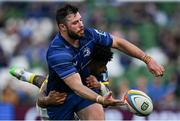 10 May 2025; Robbie Henshaw of Leinster is tackled by Fetuli Paea of Zebre Parma during the United Rugby Championship match between Leinster and Zebre Parma at the Aviva Stadium in Dublin. Photo by Brendan Moran/Sportsfile